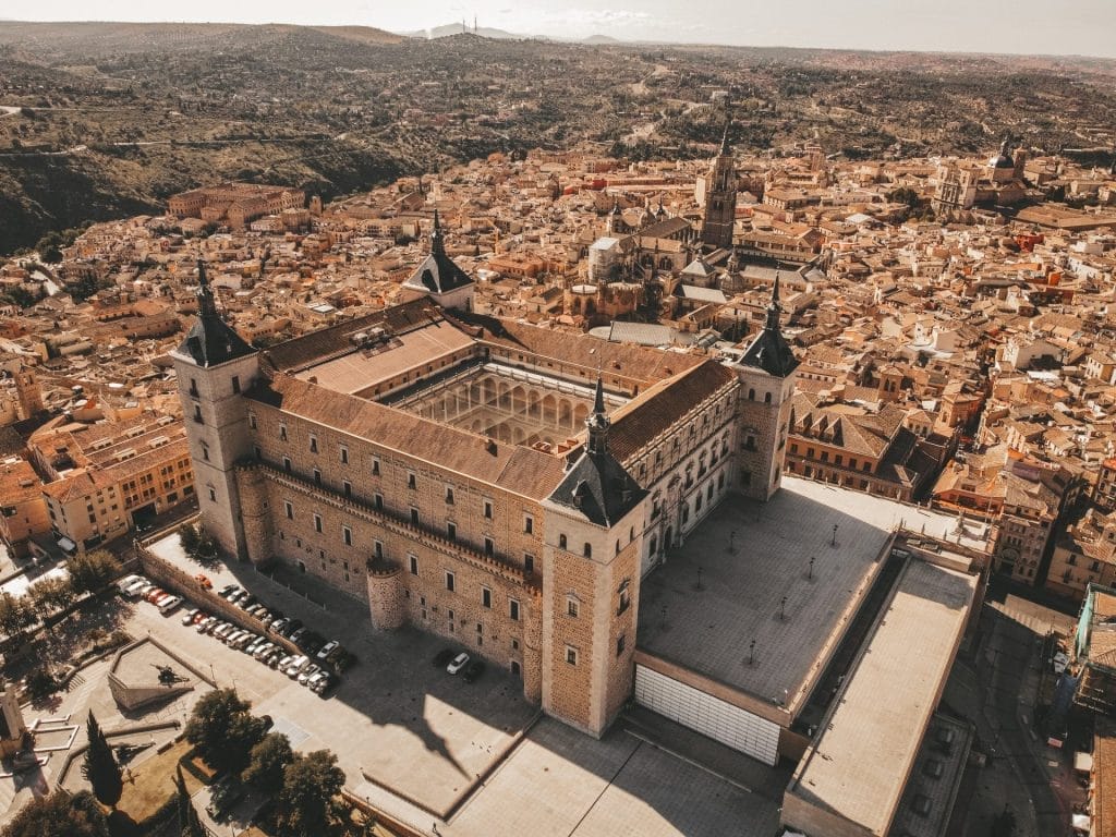 Aerial view of the Alcázar and the old town rooftops, Toledo, Spain