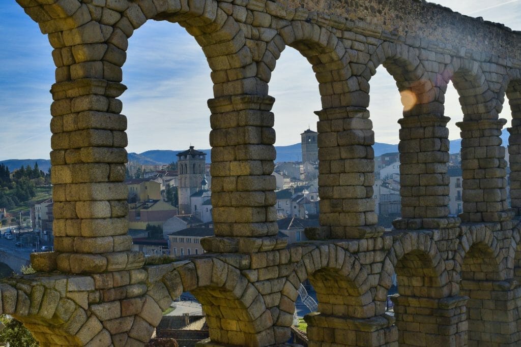 Granite arches of the Roman aqueduct above the old town, Segovia, Spain