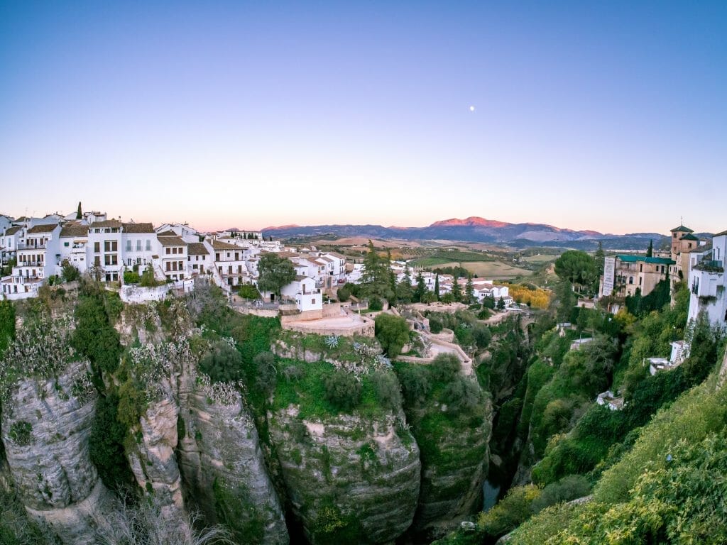 White houses along the cliff edge of the El Tajo gorge, Ronda, Spain