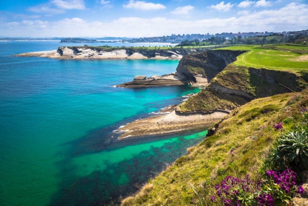 Ensenada de Mataleñas rocky cliffs and turquoise waters near Cabo Mayor, Santander, Cantabria, Spain

