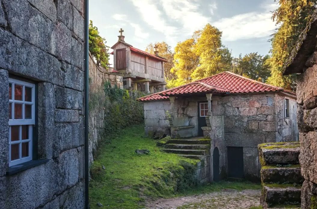 Granite houses and a traditional espigueiro granary in the village of Brufe, Peneda-Gerês National Park, Portugal