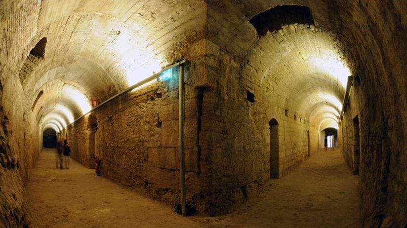 Vaulted stone galleries of the Roman cryptoporticus beneath the Machado de Castro Museum, Coimbra, Portugal