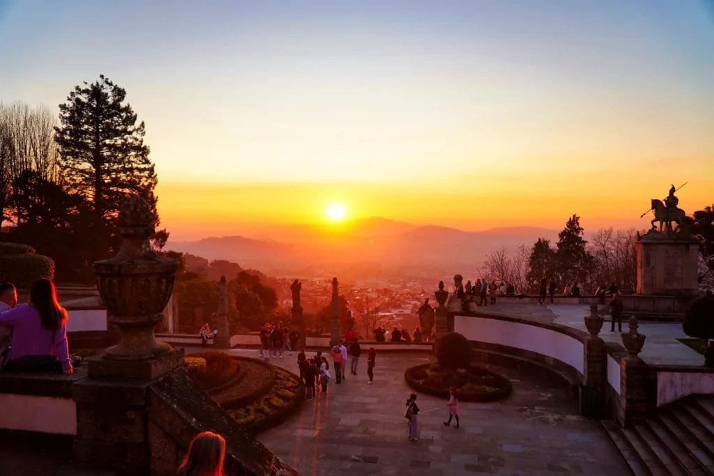 Sunset over the hills and the city of Braga seen from the terraces of Bom Jesus do Monte, Portugal