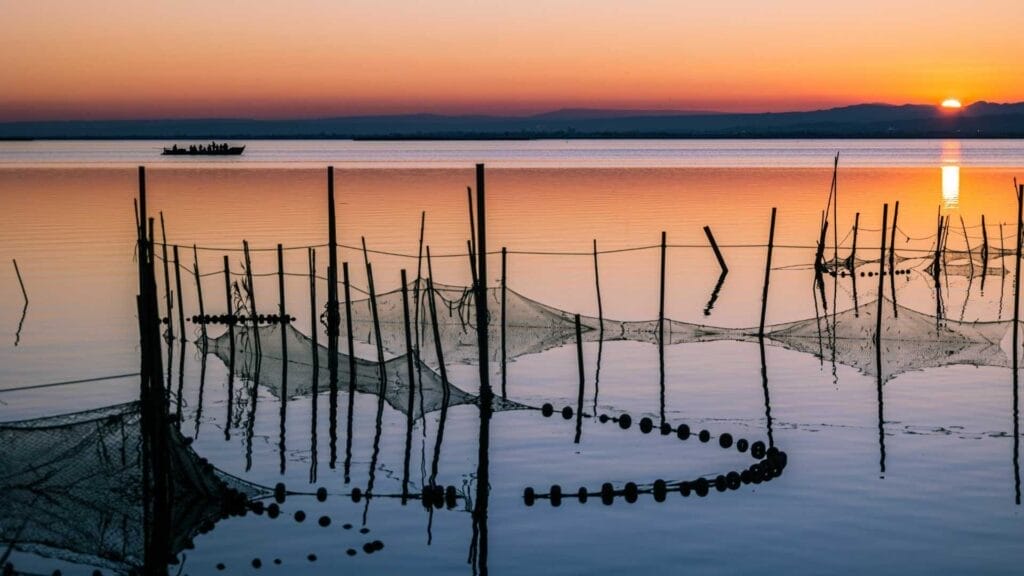 Fishing nets at sunset on the Albufera lagoon, Valencia, Spain